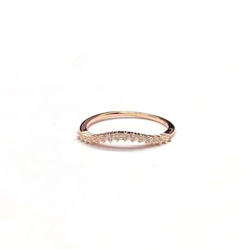 Wave silver ring with small white CZ & pink gold plating