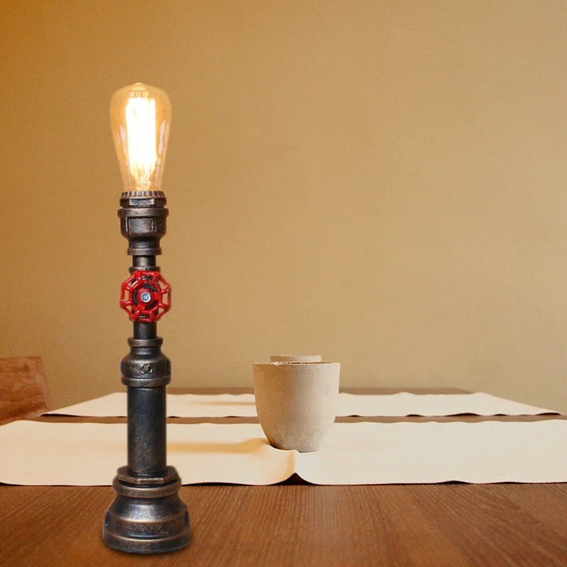 leather table lamps with a distressed texture for a rugged charmleather table lamps with a distressed texture for a rugged charmIndustrial Bronze Metallic Plumbing Pipe Table Light with Open Bulb and Valve