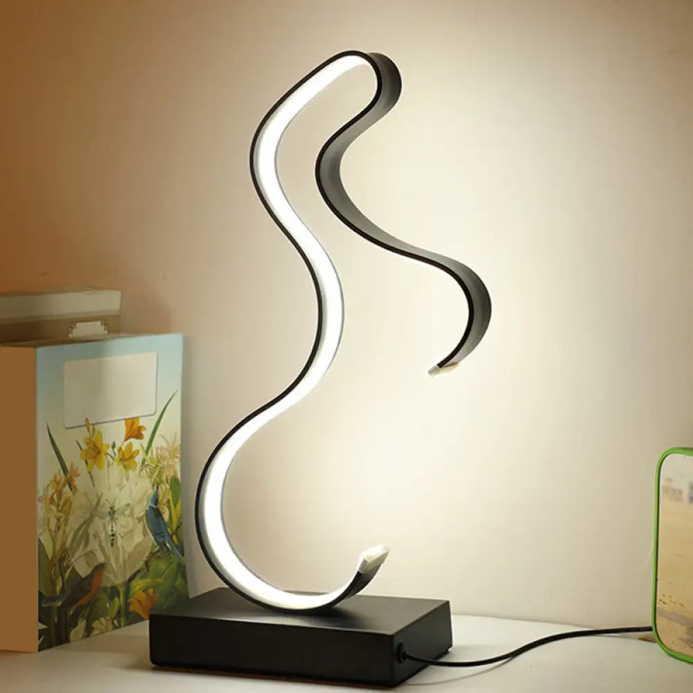wooden table lamps with natural grain for a warm and organic feelwooden table lamps with natural grain for a warm and organic feelContemporary LED Horsey Table Lamp in Black/Gold Metal with Stylish Rectangle Pedestal
