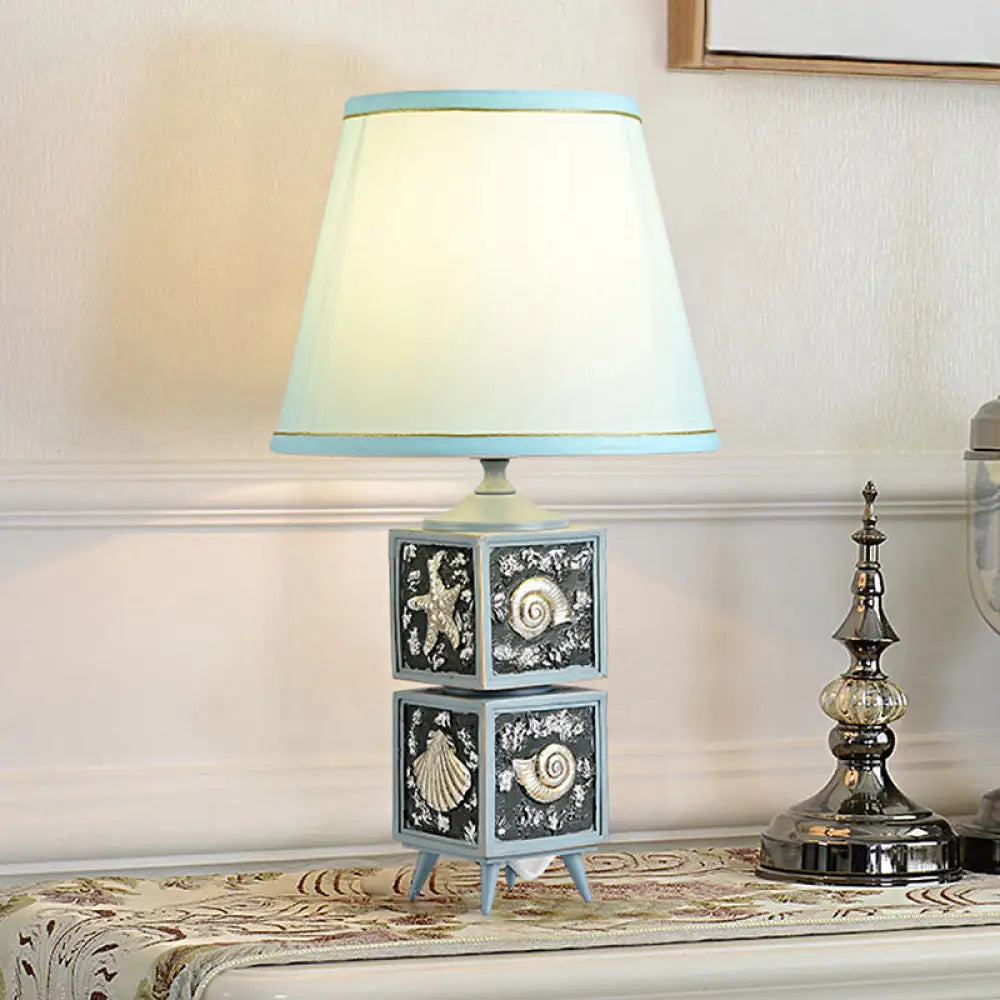 glass table lamps with a frosted surface for soft light diffusionglass table lamps with a frosted surface for soft light diffusionModern Conch Cubic Resin Night Table Lamp: Light/Sky Blue Shade, 1-Light Task Lighting