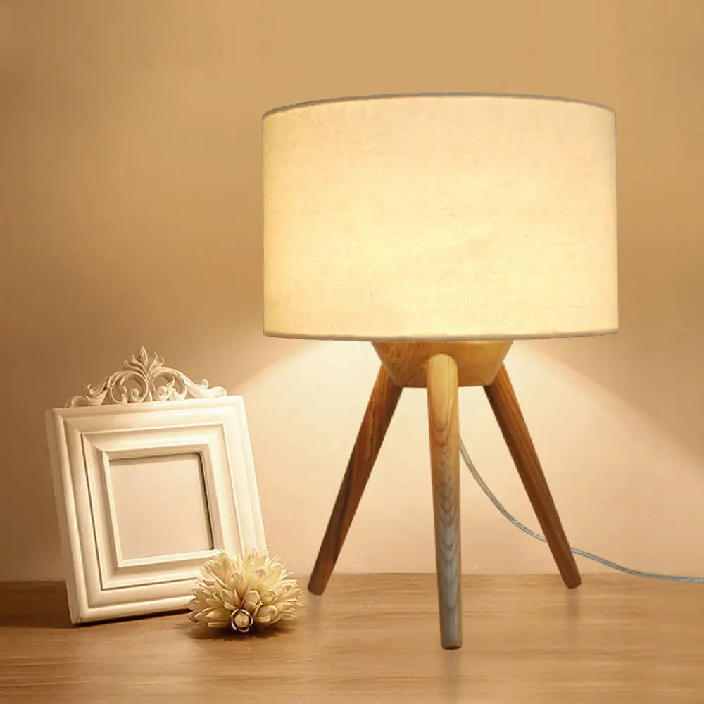 marble table lamps with a luxurious veined pattern for high end decormarble table lamps with a luxurious veined pattern for high end decorMinimalist Tripod Night Lamp with Drum Shade and Wood Base - Perfect for Single Bedrooms