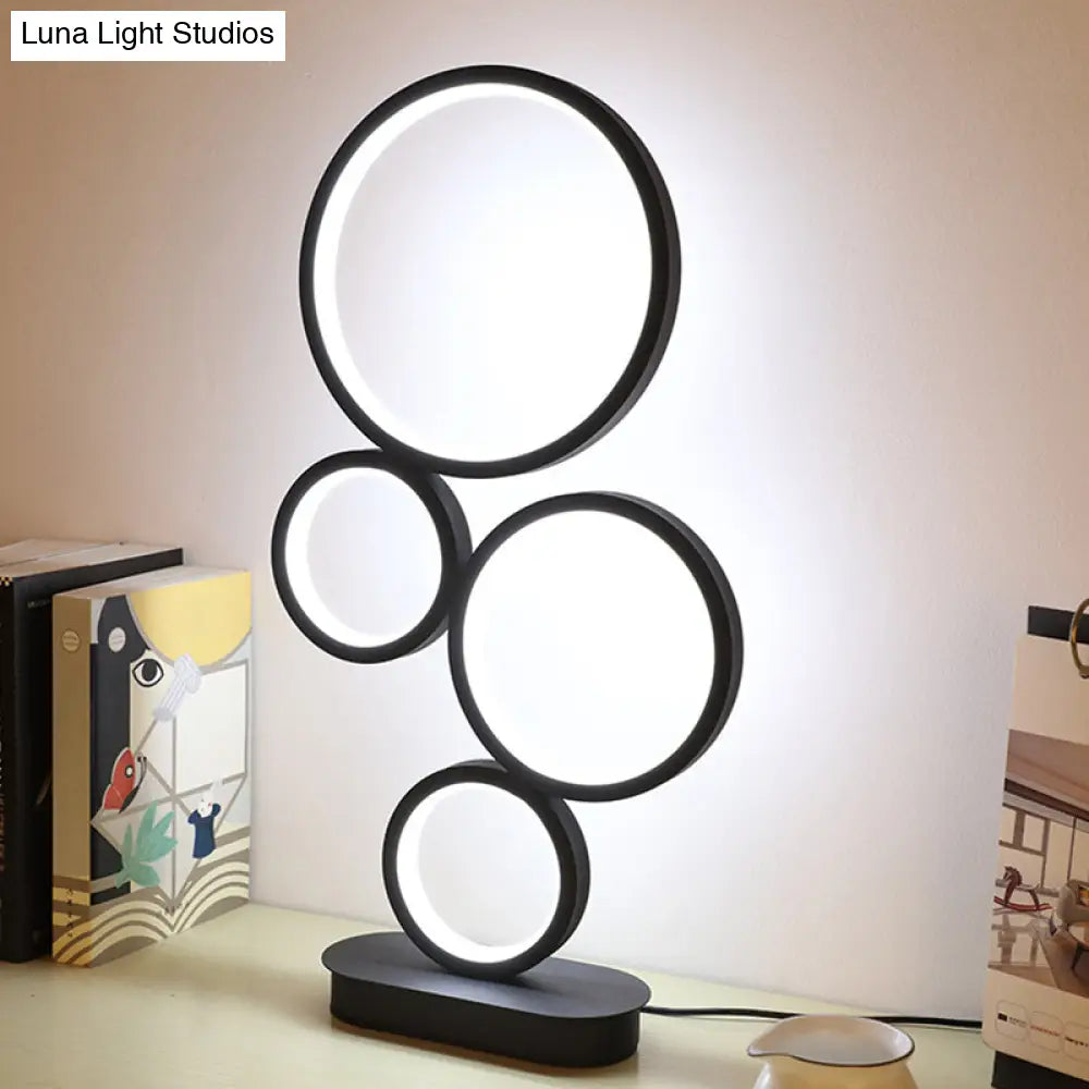 coastal style table lamps with nautical elements for beach housescoastal style table lamps with nautical elements for beach housesStacked Round Table Lamp: Modern Metallic LED Bedside Night Lighting with Black Circular Pedestal - Warm/White Light