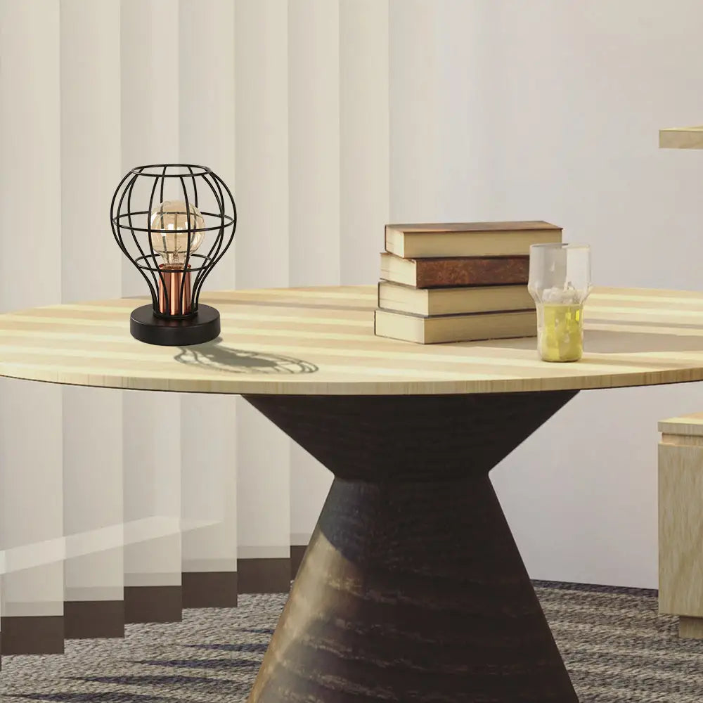 wooden table lamps with natural grain for a warm and organic feelwooden table lamps with natural grain for a warm and organic feelVintage Industrial Desk Lamp with Wrought Iron Black Finish and Cage Shade - Perfect for Coffee Shop